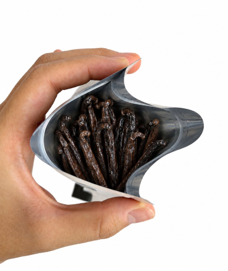 Open Vanilae pouch containing vanilla beans